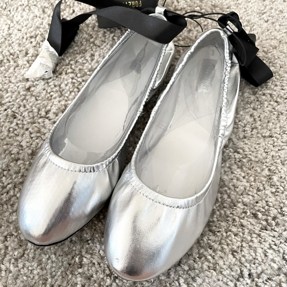 Silver ballerina flat with laces up satin strings